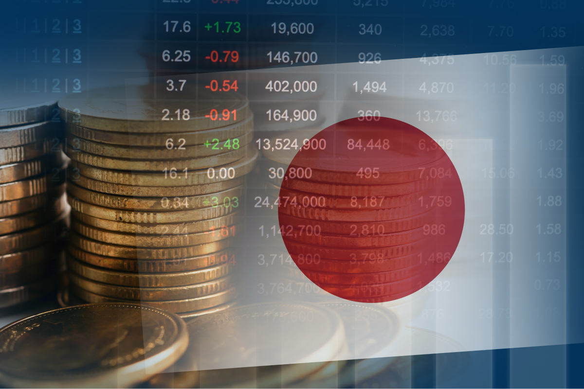 Japanese flag and coin stacks over stock data, illustrating global scope of top down analysis.